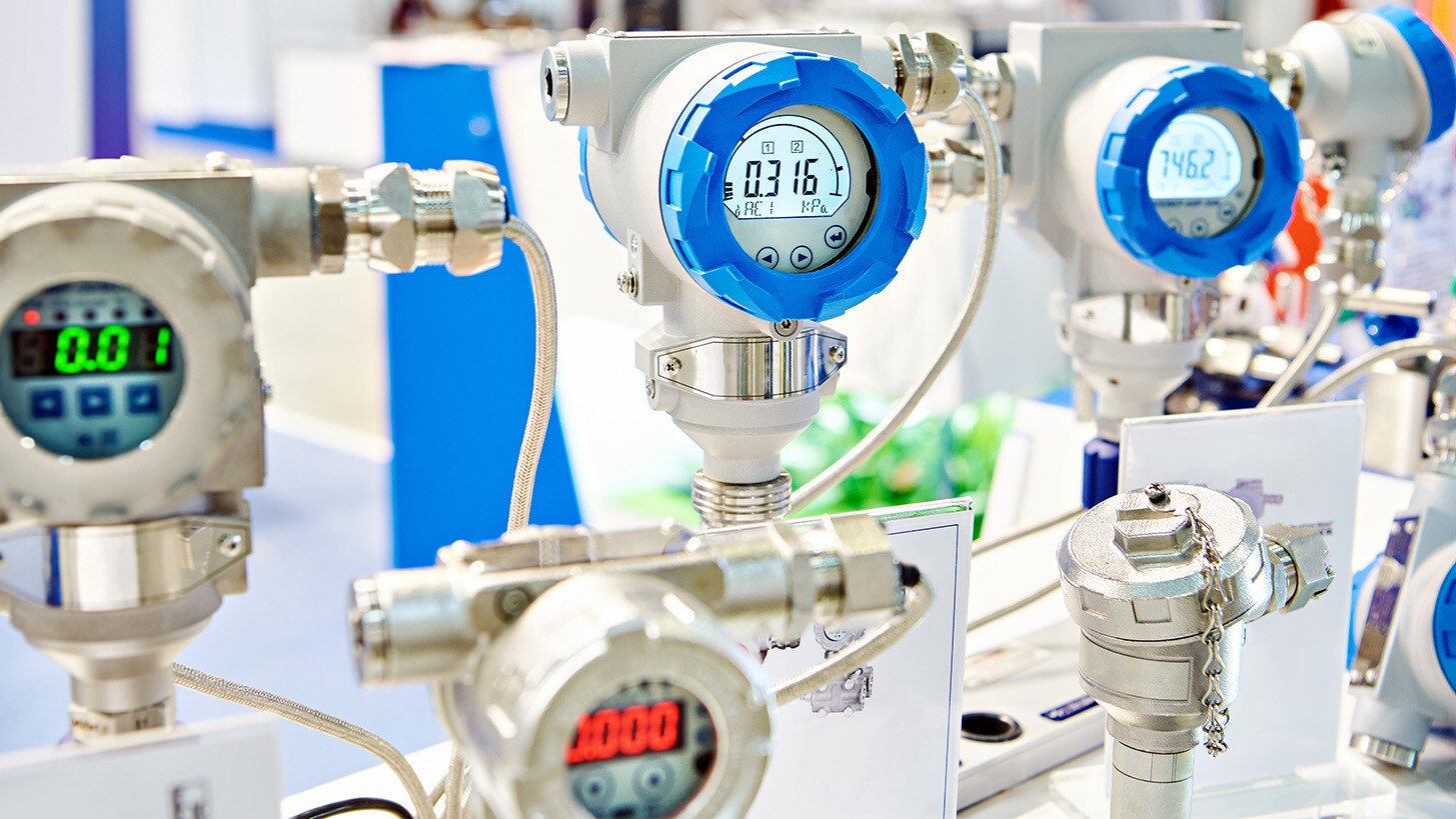 row of pressure gauges on machinery