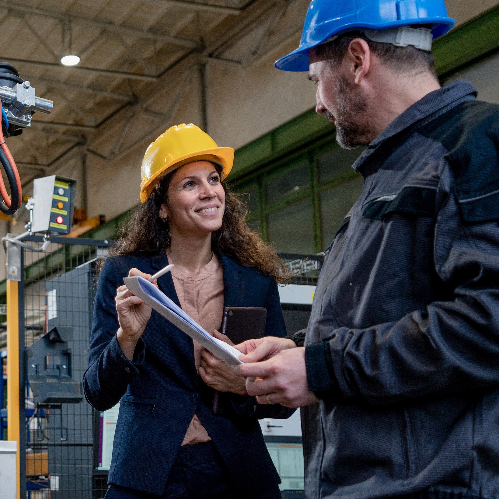 two calibration technicians reviewing temperature calibration
