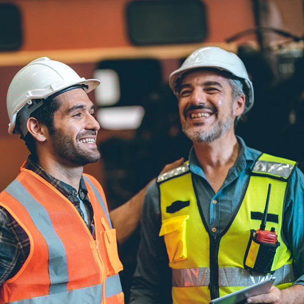 two multimeter calibration technicians